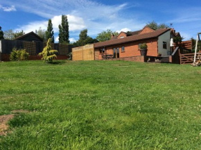Woodcutters Barn, overlooking Ledbury & Malvern Hills